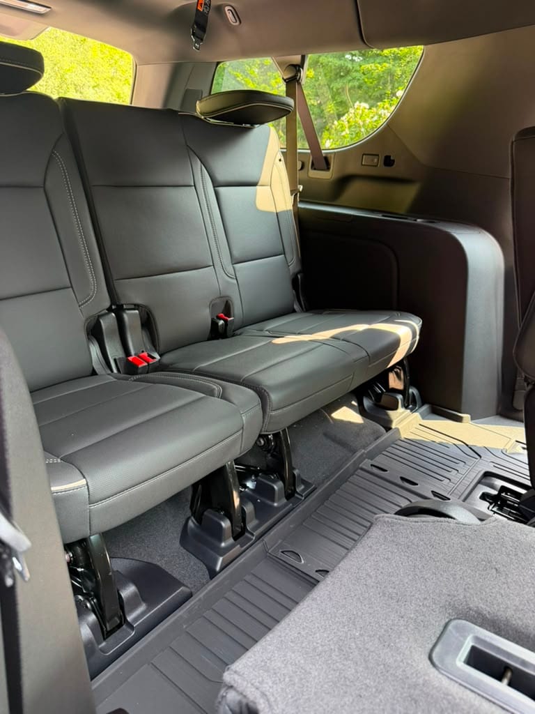 GMC SUV stretch limo third-row bench seating