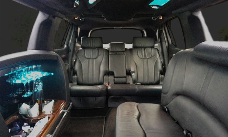 Lincoln MKT stretch limousine wet bar and rear bench seating, alternate angle