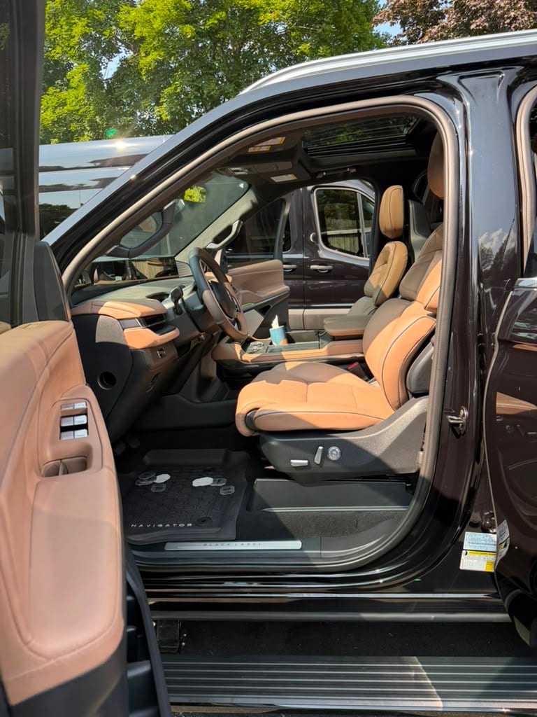 Lincoln Navigator SUV limo (burgundy) interior, Black Label cognac leather front seat
