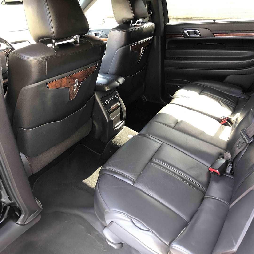 Lincoln MKT Town Car-style sedan rear leather seating with wood-trim accents